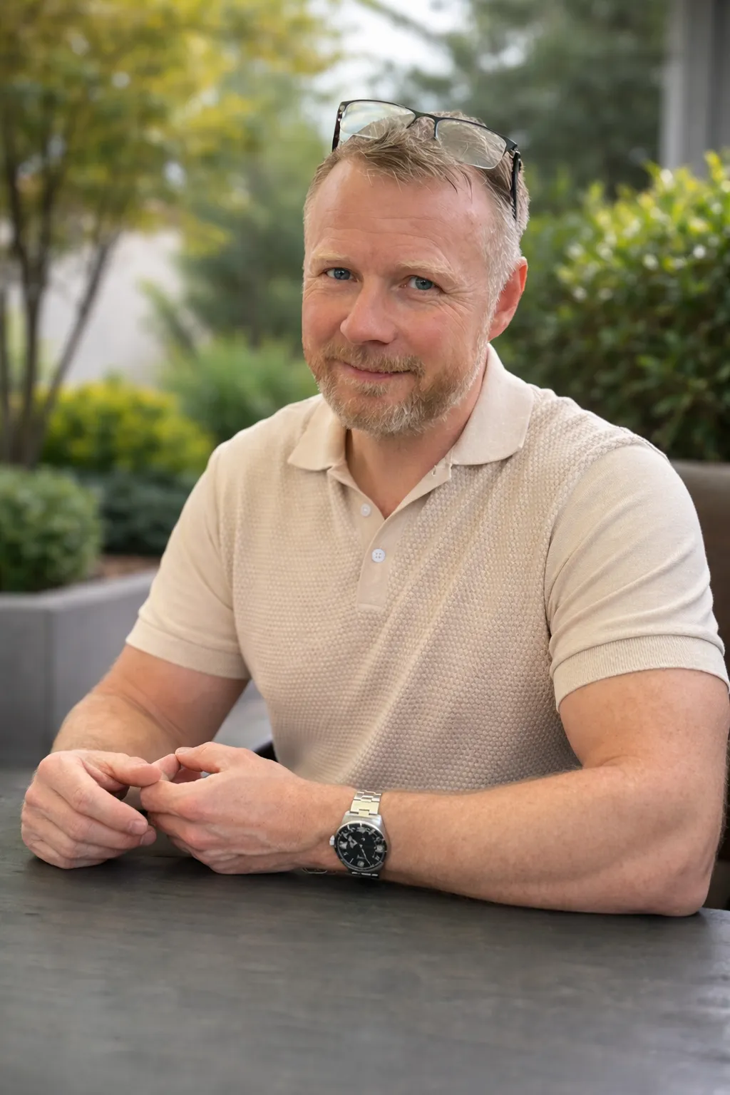 Mark Gingrass seated outdoors